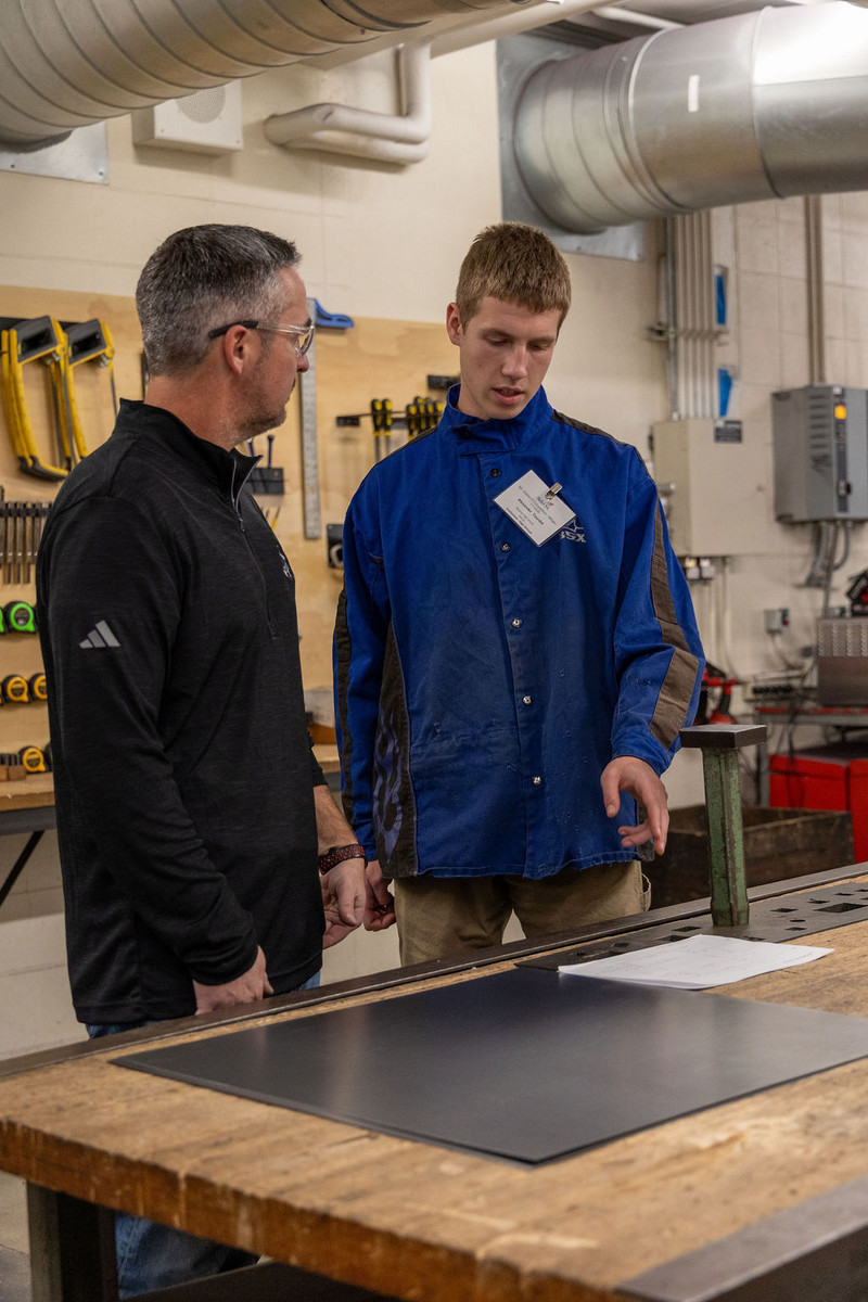 Mr Pokrzywa and a sheet metal contestant