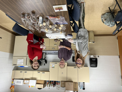 Students wrapping individual cake pops