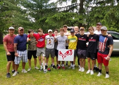 Group photo of wrestlers in summer outside