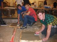 Construction I students work with concrete